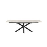 A contemporary extendable dining table with a white and gold sintered stone top and a black metal swivel base.